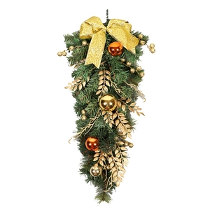 Golden and green upside-down Christmas tree ornament with large glittery bow and balls