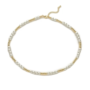 Detail of baroque pearl necklace with gold beads and adjustable lobster clasp closure