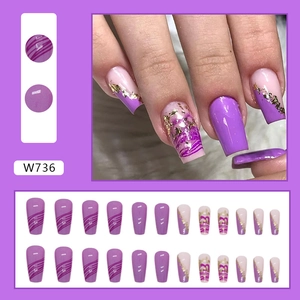 Long coffin press-on nails in romantic taro purple with gold foil and wave line patterns