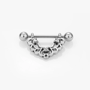 Piercing de téton en acier avec ailes en filigrane d'argent et zircons incrustés