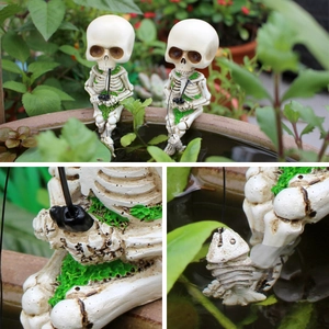 Macro shot of resin fishing skeleton figurine with green moss detail and skeletal fish