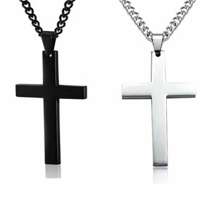 Minimalist silver and black cross pendant necklaces for men and women on white background