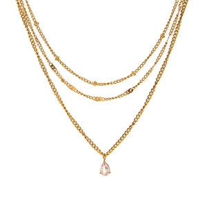 Three-layer gold stainless steel necklace with beads and a pear-cut crystal pendant