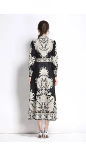 Detailed back view of long sleeve maxi dress with ethnic paisley totem pattern