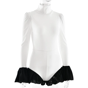 Detail of high neck bodysuit featuring white fabric and black ruffled flared cuffs