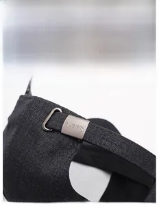 Close-up of adjustable metal buckle with Sport engraving on winter baseball cap back