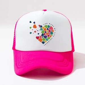 Detail of pink trucker hat featuring colorful heart print and colorful life text