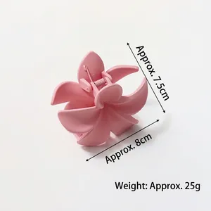 Pink matte flower hair claw clip 8cm large shark clip for women shown on white background