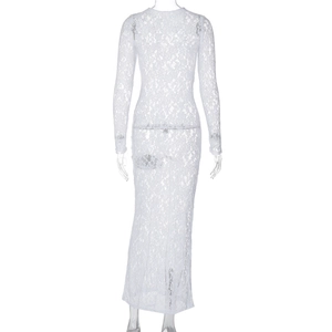 Back view of a white long sleeve lace floor-length maxi dress with sheer hollow-out pattern