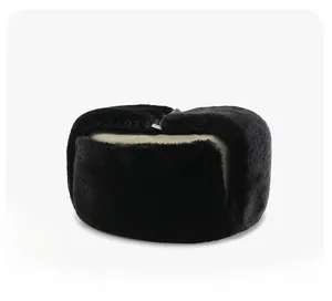 Micro side view showing the thick black faux fur lining and buckle of the winter earflap hat