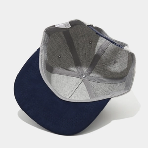 Retro contrast color baseball cap featuring navy blue brim and inner 6-panel structure