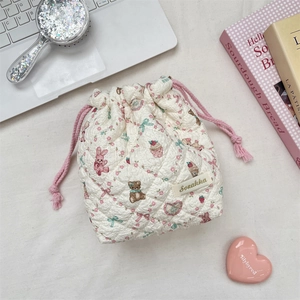 Quilted cotton drawstring storage bag featuring cute cartoon bear and rabbit patterns