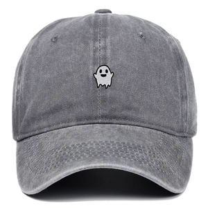Close-up of ghost embroidery detail on a washed cotton grey baseball cap with stitching