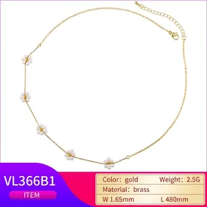 18K gold plated brass necklace featuring delicate pearl flower charms in a link chain