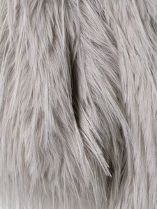 Close-up of fluffy light gray faux fur texture showing soft long fibers and premium material