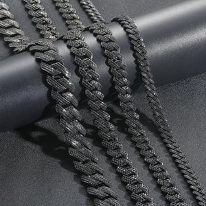Macro detail of black zircon micro-pave Byzantine bracelets in four chain widths