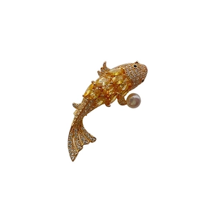 Golden koi fish brooch with yellow zircon crystals and white pearl accent