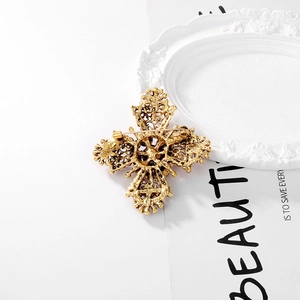 Vintage gold hollow cross brooch with baroque floral texture and alloy pin back