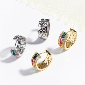 Detail of colorful zircon hoop earrings featuring a heart-shaped hollow-out inner pattern