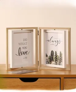 Detail view of double-sided rotating wooden picture frame with foldable hinge structure