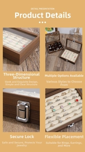 Detail view of walnut jewelry box with glass lid, metal latch, and velvet ring slots