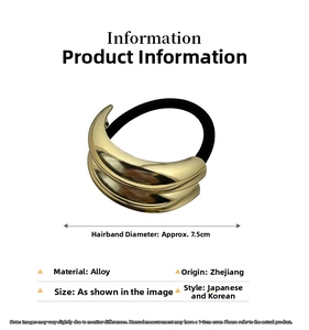 Detail of 7.5cm diameter golden alloy hair tie with a minimalist layered arc design