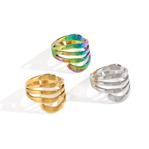 Minimalist multi-layer spiral stainless steel rings in gold, silver, and rainbow finishes