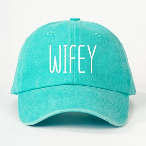 Detail view of Tiffany blue cotton baseball cap with white WIFEY printed text