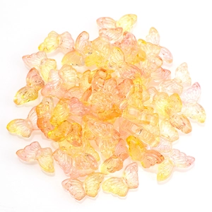 Bulk butterfly glass beads with a yellow to pink gradient for DIY jewelry making