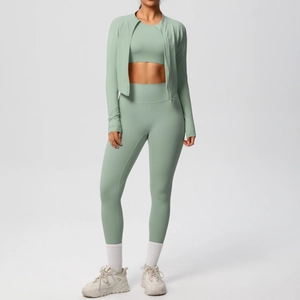 Three-piece sage green yoga set with high waist leggings and zippered athletic jacket