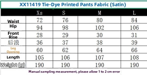 Guide des tailles détaillé pour pantalon en satin tie-dye avec mesures précises
