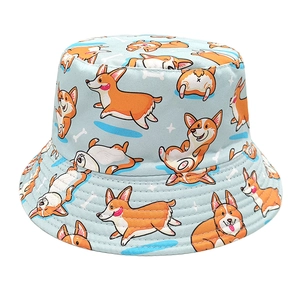 Reversible bucket hat with cartoon corgi print in light blue cotton for sun protection