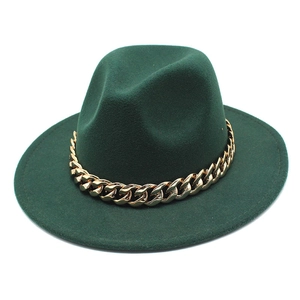 Detail showing high-quality dark green wool felt hat with decorative thick gold chain band