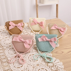 Détails de sacs à bandoulière en paille pour enfants avec nœud rose doux en cinq couleurs