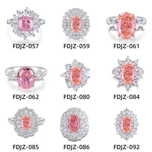 Collection of nine S925 sterling silver rings with pink heart zircon gemstones in grid