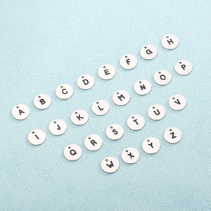 Set of 26 silver-tone stainless steel alphabet letter charms for jewelry making