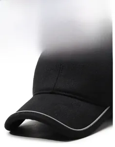 Close-up of black baseball cap with wool fabric, reflective brim and metal Fashion plate
