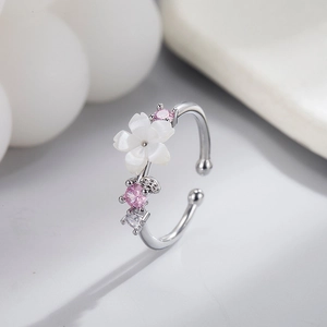 Elegant silver open ring with shell cherry blossom flower and sparkling zircon stones