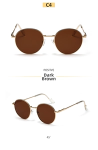 Detailed front and 45-degree side views of retro round green sun glasses with gold frames