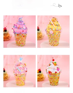 Detail view of DIY cream glue ice cream ornaments in four styles with charms and pearls