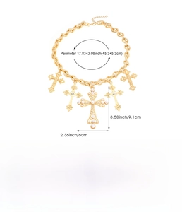 Detailed view of golden multi-layer cross necklace with dimensions and weight specs