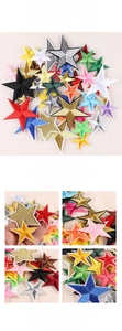 Macro detail of colorful star embroidered patches for garment DIY and sewing decorations