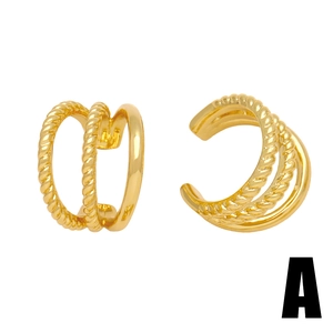 Gold triple-layer C-shaped ear cuffs with twisted rope texture and polished finish