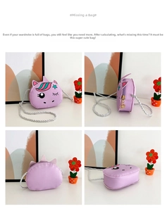Detail view of purple unicorn purse with zipper closure and silver rope strap
