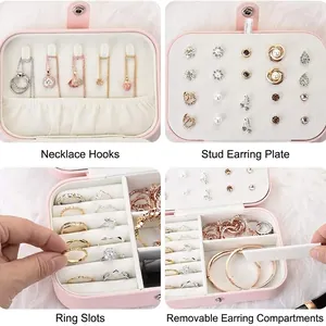Pink waterproof PU leather jewelry box with multiple storage slots for rings and necklaces