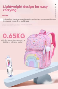 Lightweight pink school bag weighing 0.65kg with rainbow pattern and water bottle contrast