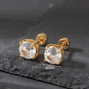 Detail view of 6mm round clear zircon studs with golden stainless steel screw back
