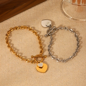 Golden and silver OT buckle stainless steel bracelets with heart-shaped pendants