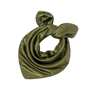 Detail showing smooth olive green satin fabric with an elegant glossy finish and soft texture