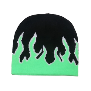 Hip hop knitted beanie featuring a vibrant green flame pattern on a black base for winter